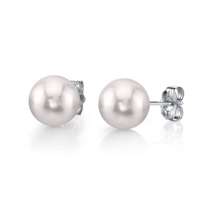 Pair of pearl earrings on a white background