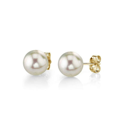 Pearl earrings with gold posts on a white background